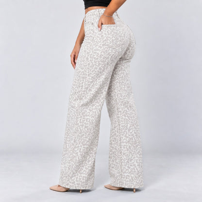 White Leopard | Back three-quarter, hand in pocket
